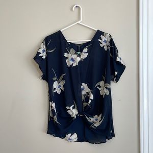 Blue blouse with white flowers